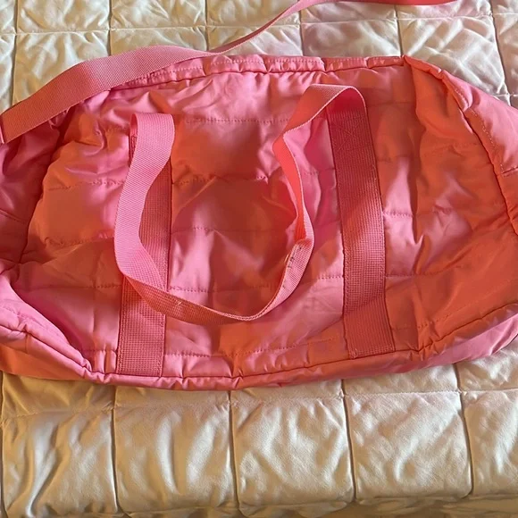 PINK tote bag; 16 inches long 7 inches tall. Has a  detachable shoulder strap. - Picture 3 of 4